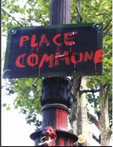 Plaque parisienne taguée "Place Commune"